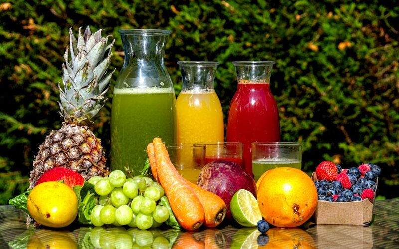 fruits and vegetable in clear glass jar